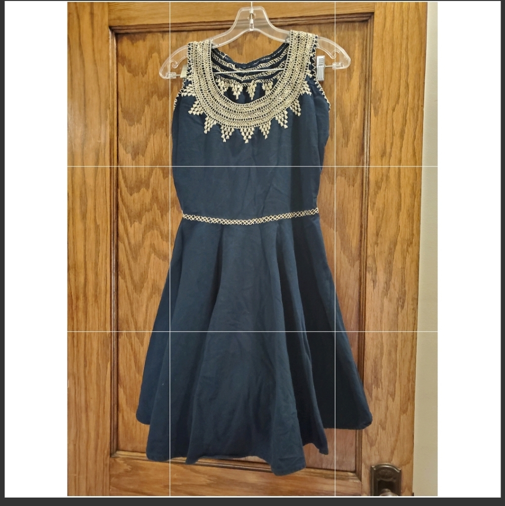 Embroidered dress. Fits like a 6. Navy blue. Sleeveless. Women's Pintucking.